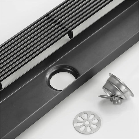 Top Notch Rectangular Linear Shower Drain Featuring Heavy Duty Stainless Steel Construction removable grate and hair catcher.