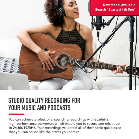 Woman using Scarlett 2i2 Studio 3rd Gen USB Audio Interface Bundle with guitar, microphone, and headphones for recording