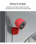 Nest Cam Indoor Wired 3rd Gen Security Camera mounted on a wall, showing red finish and adjustable angle, 2025 model.