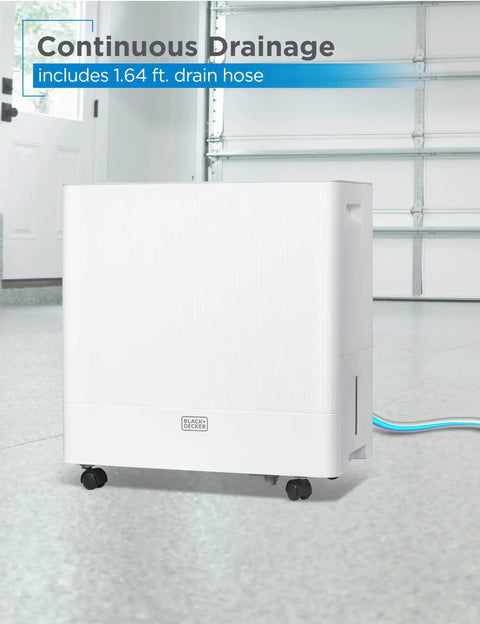 Heavy Duty Portable 50 Pint Dehumidifier For Damp Basements And Closets With Continuous Drain Hose and removable bucket in garage.
