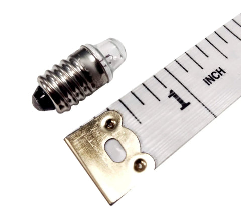 Pack Of 10 E10 Miniature Screw Base Light Bulbs 2.5 Volt 0.3 Amp next to a ruler for size comparison, showcasing the bulb design.