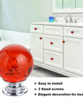 Ten Pack Of Slick Red Crystal Glass Bubble Cabinet Knobs Round Drawer Pulls And Dresser Handles For Kitchen Cupboards With Zero Hassle Mounting Hardware 30 mm Size in bathroom with red crystal knobs on white cabinets.