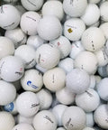 Close-up of assorted recycled golf balls stacked for Assorted Recycled Golf Balls In Mesh Drawstring Bag 48 Pack Durable Practice And Play Balls For Beginners And Casual Players Perfect For Range Sessions Backyards And Weekend Rounds.