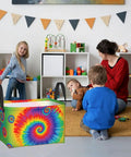 Hella Spacious Waterproof Storage Bin With Rainbow Tie Dye Design and Secure Carry Handles in a playroom with kids.