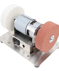 Powerful 100 Watt Mini Bench Grinder With Dual Wheels And Adjustable Speed For Smooth Wood Polishing And Steel Sharpening A Tight Little Workshop Essential with metal base and dual grinding wheels.