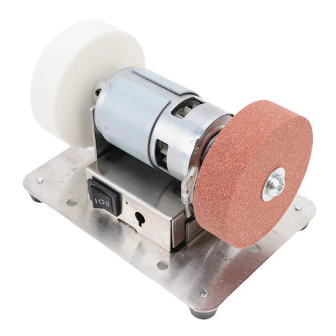 Powerful 100 Watt Mini Bench Grinder With Dual Wheels And Adjustable Speed For Smooth Wood Polishing And Steel Sharpening A Tight Little Workshop Essential with metal base and dual grinding wheels.