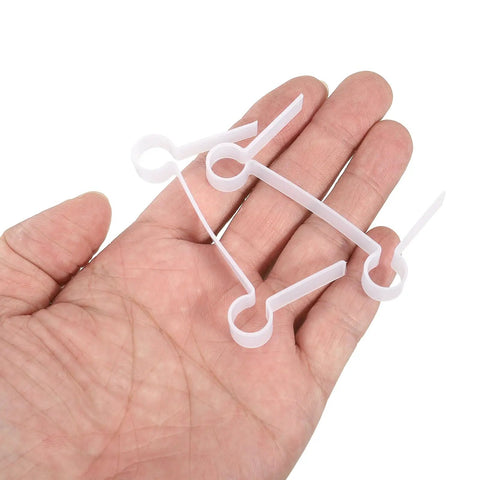 Badass Heavy Duty Shower Door Hinges, White Plastic Frame Mount With Tight Seal Rubber Gaskets For Glass Panels shown in hand.