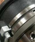 Close-up detail of the 12 Inch Precision Rotary Table Featuring Killer Accuracy 10 Inch 3 Jaw Chuck with graduated scale.