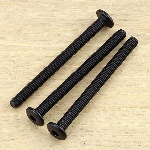 10 Sets Top Shelf M6 75mm Black Coated Flat Head Socket Cap Screws With Binding Nuts And 4mm Hex Wrench Rock Solid 304 Stainless Steel Furniture Connectors For Bed Cabinet No Sweat Diy Jobs, three black screws on wood.
