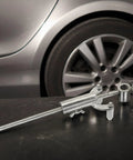 Heavy Duty Adjustable Wheel Arch Scriber And Garage Ready Automotive Body Line Gauge on a table with silver coating and solid iron tip.
