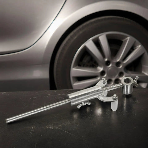 Heavy Duty Adjustable Wheel Arch Scriber And Garage Ready Automotive Body Line Gauge on a table with silver coating and solid iron tip.