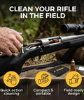 Remington Model 700 Field Cleaning Kit With Quick Action Brush And Tough As Nails Steel Bolt Opener Including Five No Nonsense Replacement Swabs For Gritty Raceway Lugs And Snappy Firing Pin Service, person using quick action brush on rifle.