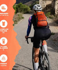 Cyclist wearing Dope Lightweight Hydration Hiking Backpack with 2L Water Bladder, 20L Daypack on a road.