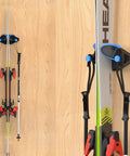 Sleek Ski Wall Mount And Snowboard Storage Rack For Garage Walls Featuring Scratch Guard Rubber Grips And Multi Pole Side Hooks For A Badass Winter Setup 1 Pack showing mounted skis and ski poles on a wall.