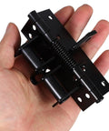 Invisible Self-Closing Door Hinges With Adjustable Spring Tension And 90 Degree Rotation in zinc alloy held in hand