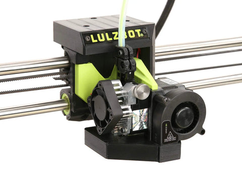 Close-up of TAZ Workhorse Pro 3D Printer With Premium E3D Hot End and Belt Driven Z Axis showcasing cooling fan and tool head.