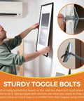 Person using heavy duty drywall toggle bolt set with 34 piece pack for hollow walls, includes quarter inch screws, in home setting.