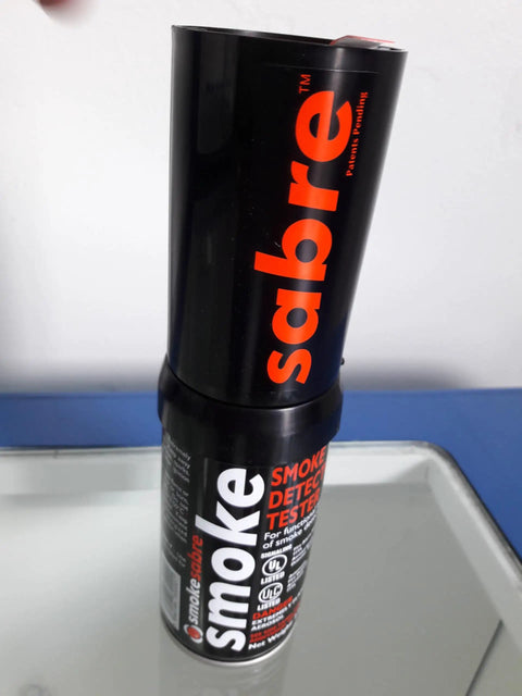 Solid Pick Aerosol Smoke Detector Test Spray Nailed It Fire Alarm Activator Pro Safety Tool on reflective surface.