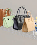 Eight Pack Heavy Duty Wire Shelf Dividers To Keep Your Closet Space Square And Spotless supporting various bags on a wire rack.