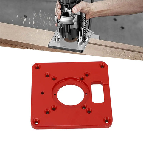 Boss Level Red Aluminum Alloy Router Table Insert Plate With Sweet Slick Surface and Dead Eye Alignment Scale Markings placed on workbench.