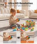 Child playing with colorful blocks in living room showcasing Indoor Outdoor 2K Security Camera With 5G And 2.4G WiFi capabilities.