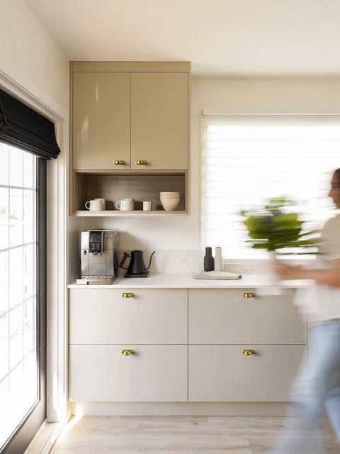 Brushed Gold Oval Cabinet Knobs Mounted On Square Backplates, Killer Hardware For Cupboards And Dressers, Anti Corrosion Finish That Is Slick And Durable, Total Game Changer, 6 Pack in a modern kitchen setting.