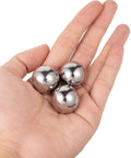 Top Shelf Precision Ground Chrome Steel Ball Bearings Three Quarter Inch Loose Pack held in hand, showing smooth finish and size.