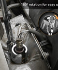 Heavy Duty 22 Mm Socket Wrench With Smooth 180 Degree Swivel Head For Tight Spots shown in use on an engine bolt.