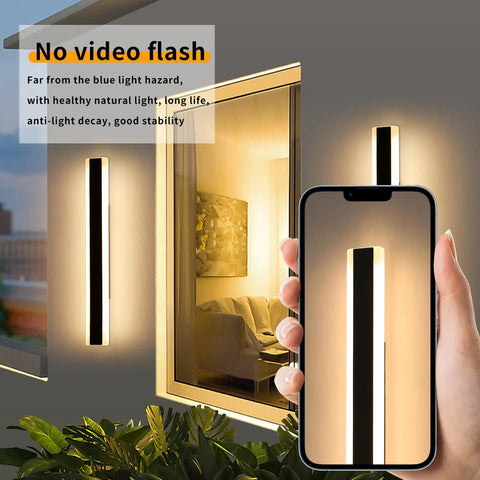 Slick Modern Outdoor Wall Lights 2 Pack Black Exterior Sconces Featuring Adjustable Four Directional Arms And Top Shelf Weatherproof Build Badass Hardwired Porch Lamps Sweet For Garage Or Patio mounted beside a window.