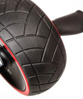 Killer Ab Rocker And Complete Core Toning Setup featuring heavy duty, wide non-slip wheel with textured tread pattern.