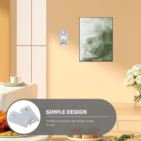 Heavy Duty Stainless Steel Picture Hangers Built Tough Wall Mount Brackets For Mirrors And Artwork Four Pack shown mounted on wall.