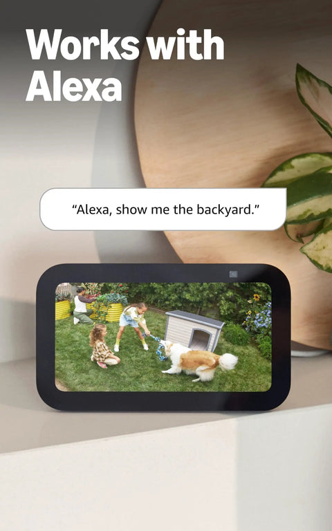 Smart display showing live outdoor camera feed with Alexa voice command. Interface depicts a backyard scene with children and a dog.