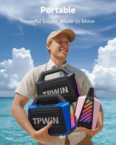 Man holding 80W Portable Bluetooth Speaker With Big Bass And Rugged Outdoor Vibe, shown on a beach, IPX6 waterproof.