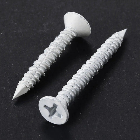 30 Pack 1/4 X 1-3/4 Inch White Flat Head Concrete Screws Professional Carbon Steel Masonry Anchors For Brick Block Stucco Walls Rated Tough For Any Daily Grind close-up of two screws