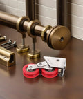 Heavy Duty Stainless Steel Double Roller Sliding Door Replacement Pulleys Built Tough With Sealed Ball Bearings on a workbench.