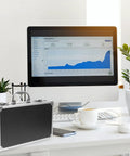 Kickass Aluminum Toolbox Carrying Case With Grip Handle on desk near computer, ideal for office stationery essentials.