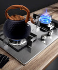 Loud Stovetop Tea Kettle With Whistle For Boiling Water Coffee Or Milk 3.1 Quart Heavy Stainless Steel Black With Wood Pattern Handle And Diamond Design Easy Button Release Spout on stove