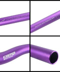 Close-up of purple MTB 31.8mm Riser Handlebar Extra Long 720mm or 780mm Aluminum Alloy Built For Downhill Trail Racing components.