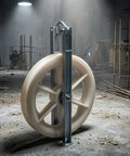 Heavy Duty Galvanized Cable Pulley Block With Rotating Hook And Quiet Nylon Sheave Built Like A Tank With Channel Steel Housing For Seamless Overhead Rigging in a construction setting.