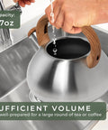 Filling Stovetop Whistling Tea Kettle Two Point Four Quart Stainless Steel For Induction And Gas Stovetops Durable Rust Resistant