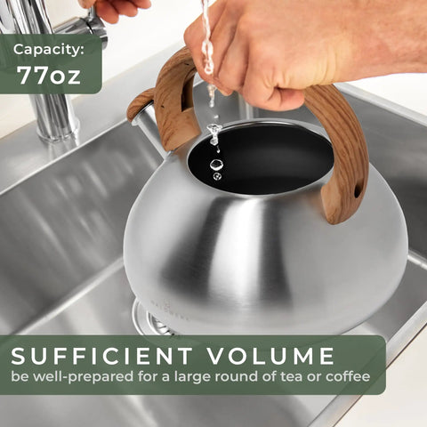 Filling Stovetop Whistling Tea Kettle Two Point Four Quart Stainless Steel For Induction And Gas Stovetops Durable Rust Resistant