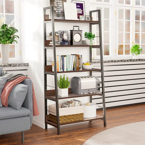 Solid Five Tier Industrial Ladder Bookshelf In Rustic Brown, Steel Frame Leaning Rack For Plants And Daily Gear, Hella Sturdy Freestanding Floor Bookcase For Chill Living Rooms Or Crisp Home Studios in a cozy living room setting.