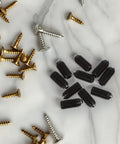10Pc Carbon Steel Hex Head Ball Plunger Screws Black Spring Loaded Positioning Grubs For Tools And Fixtures on marble surface.