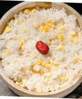 Premium Handcrafted Wood Steamed Rice Bucket With Lid, round beige cask filled with rice and corn.