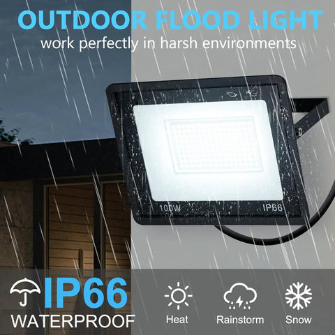 Top Shelf 4 Pack 100W LED Flood Lights Super Bright Security Fixtures With Plug And Play Cable IP66 Waterproof Outdoor Court Lighting 5000K Daylight White mounted on a wall under rain.