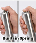 Hand holding Two Pack 16 Inch Conveyor Roller And Bracket Set With 1.5 Inch Diameter Pro Grade Heavy Duty Galvanized Steel with built-in spring mechanism