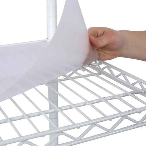 Hand placing a cover on a Seven Tier Heavy Duty Wire Shelving Unit With Wheels Adjustable Metal Rolling Rack for Garage Kitchen Pantry.