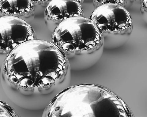 Get Top Shelf Performance With These Bad Ass High Precision G Twenty Five Grade Chrome Steel Ball Bearings Measuring One Point Five Inch In Diameter Hot Forged For Ultimate Durability And Reliability Perfect For Heavy Duty Applications, close-up view of polished chrome steel ball bearings.