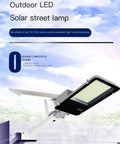 Outdoor Solar Security Flood Light With Remote And Dusk To Dawn Sensor Super Bright Led Yard Lighting mounted on a wall.
