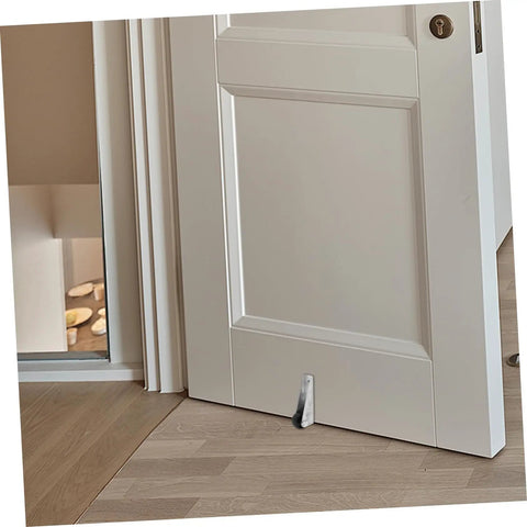 Heavy Duty Five Pack Sliding Door Bottom Guide Rollers With Slick Black Nylon Wheels And Rock Solid Steel Build For A Buttery Smooth Glide Across Universal Tracks With Easy Peasy Installation shown on a door.
